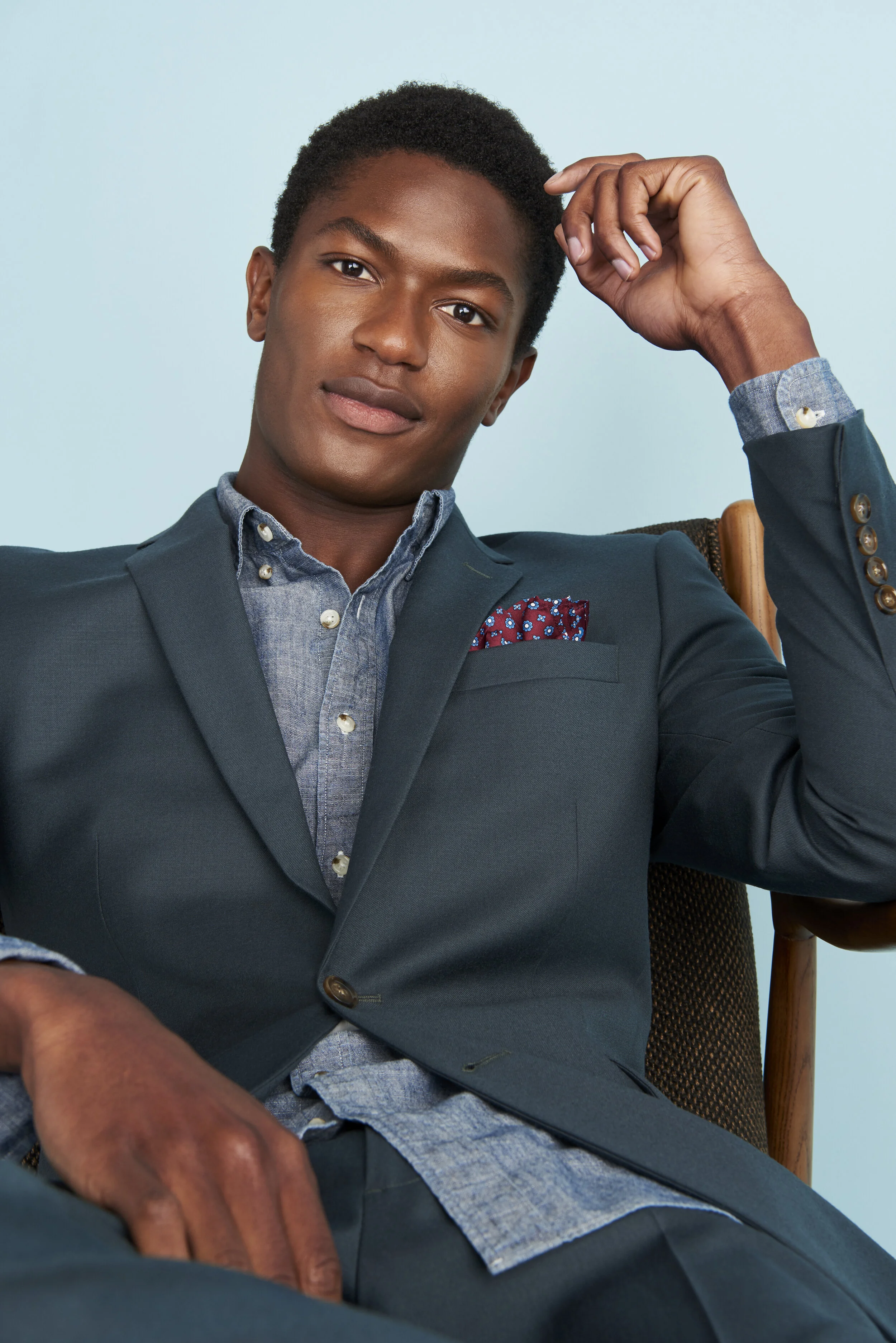 Hamid green suit portrait seated.jpg