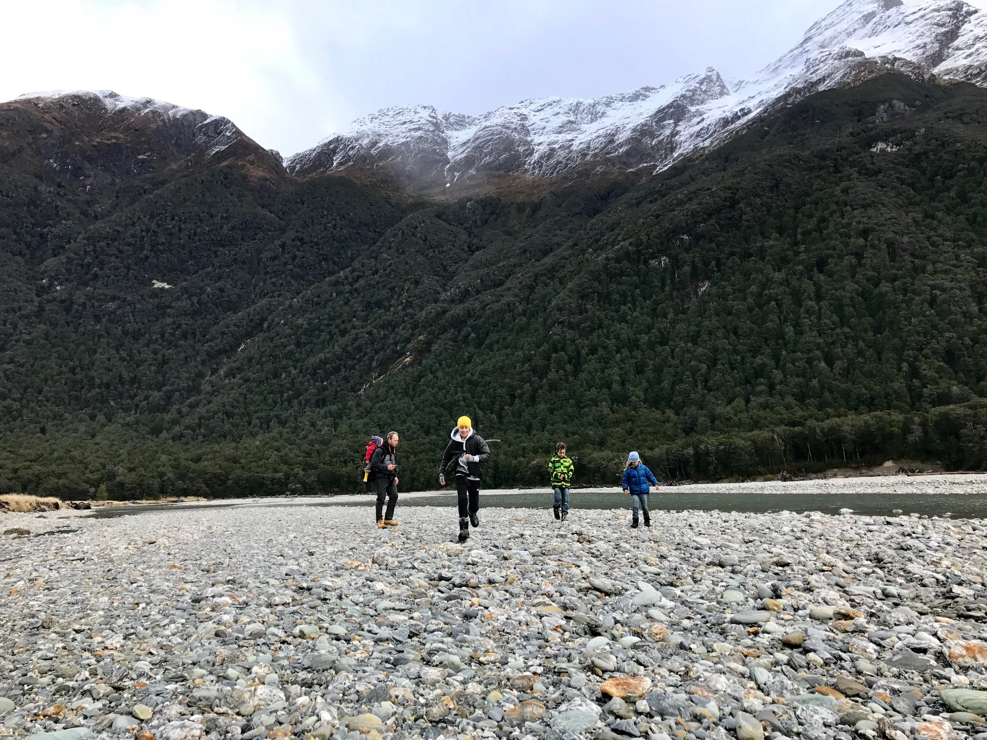 Exploring the South Island with our family. After days of skiing, we were taking a break from skiing and hiking through the Rees Valley . Rees River flowing by in the background. Photo taken by Lyzadie.