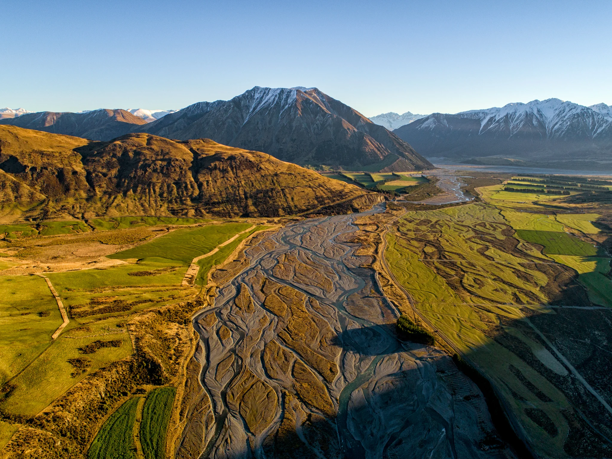 The Harper River dresses in gold as the sun's rays kiss it goodnight. (Talman Madsen)
