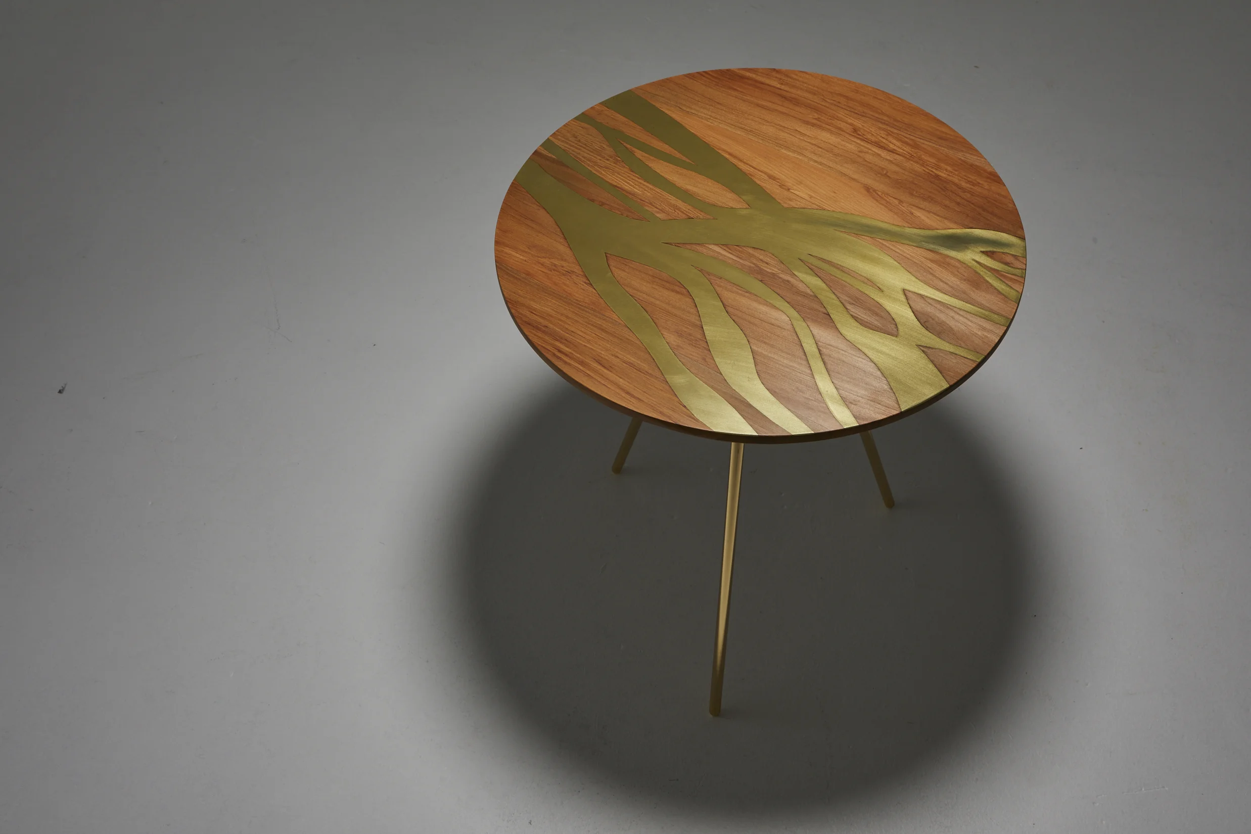 Flow Side Table - Made of River Rescued Rimu and brass.