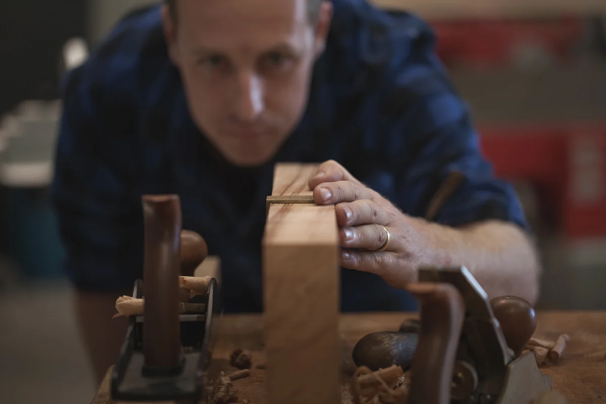 Sam James from Sam James Furniture in his workshop in Tauranga, New Zealand.
