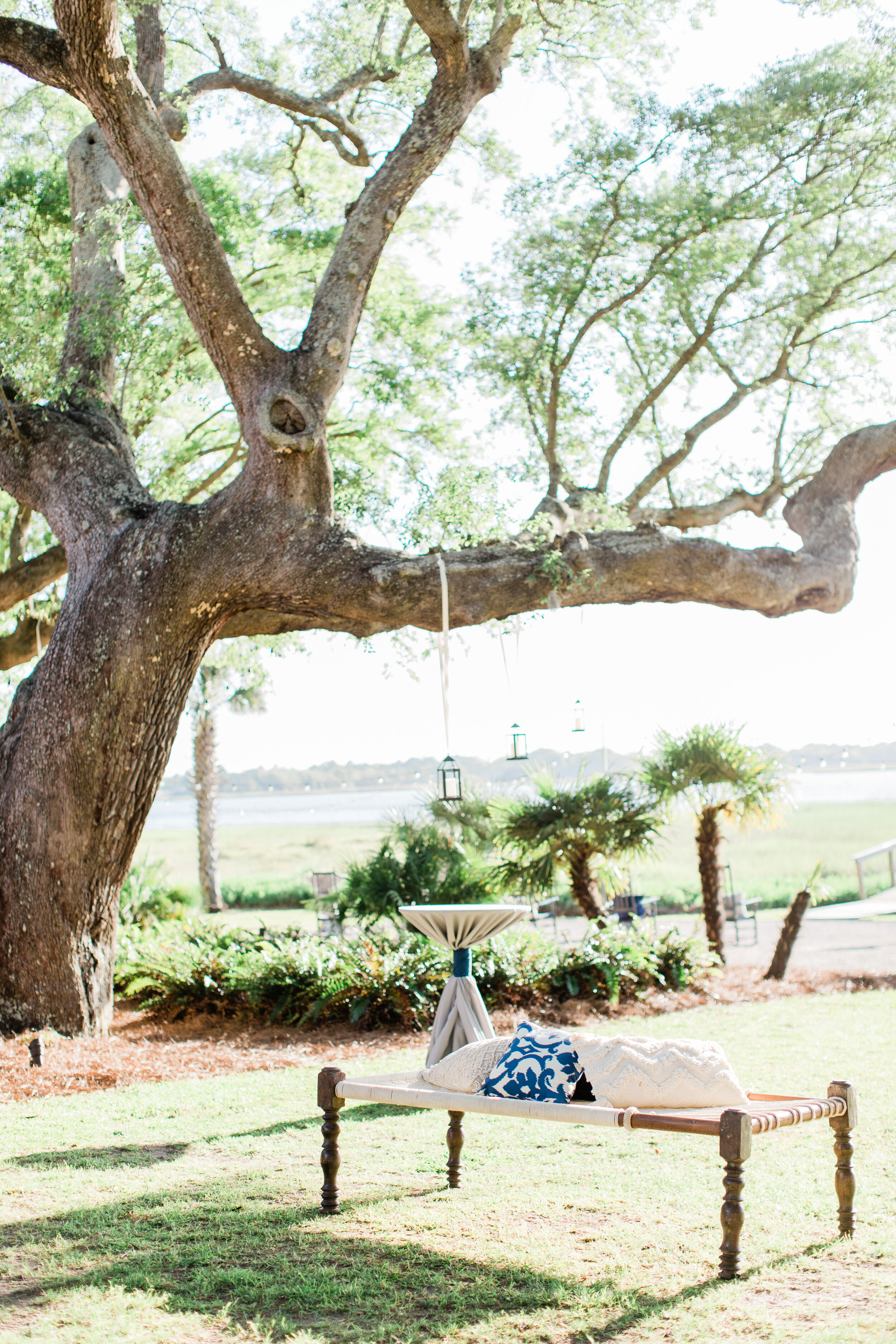 Lowndes Grove - Cocktail table & lantern with bench - Rachel & Tyler - Ava Moore Photography.jpg