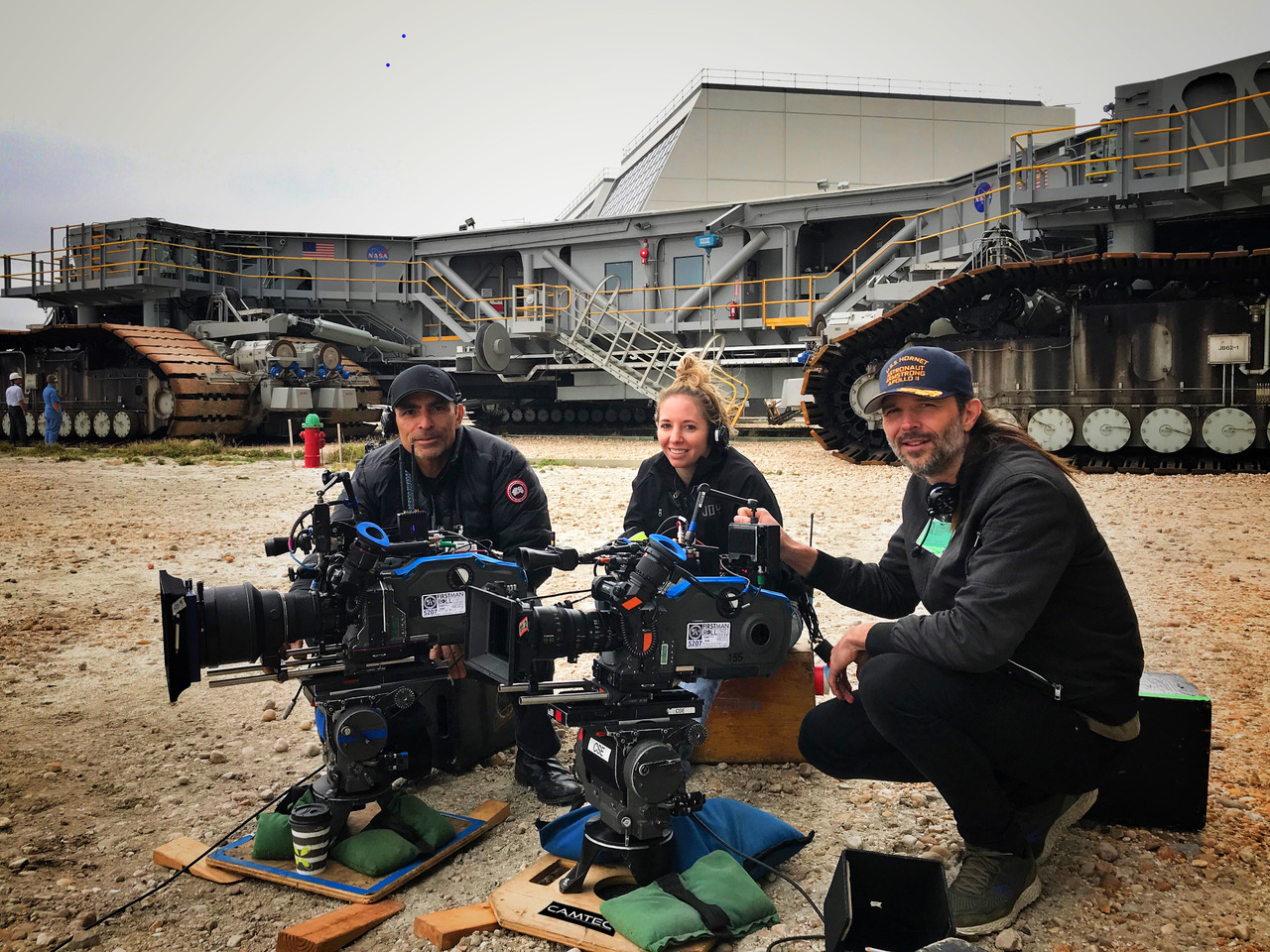 (Left to right) 1st AC Jorge Sanchez, 2nd AC Melissa Fisher, and DP Linus Sandgren, on location for First Man with two Aaton Penelope 35mm cameras. 