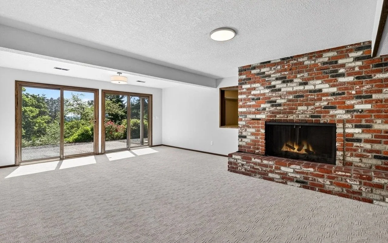 MID-MOD REBUILD - A 1973 Portland family home, renovated for resell, following intense winter storm damage. SCOPE: flooring, tile and countertop sourcing