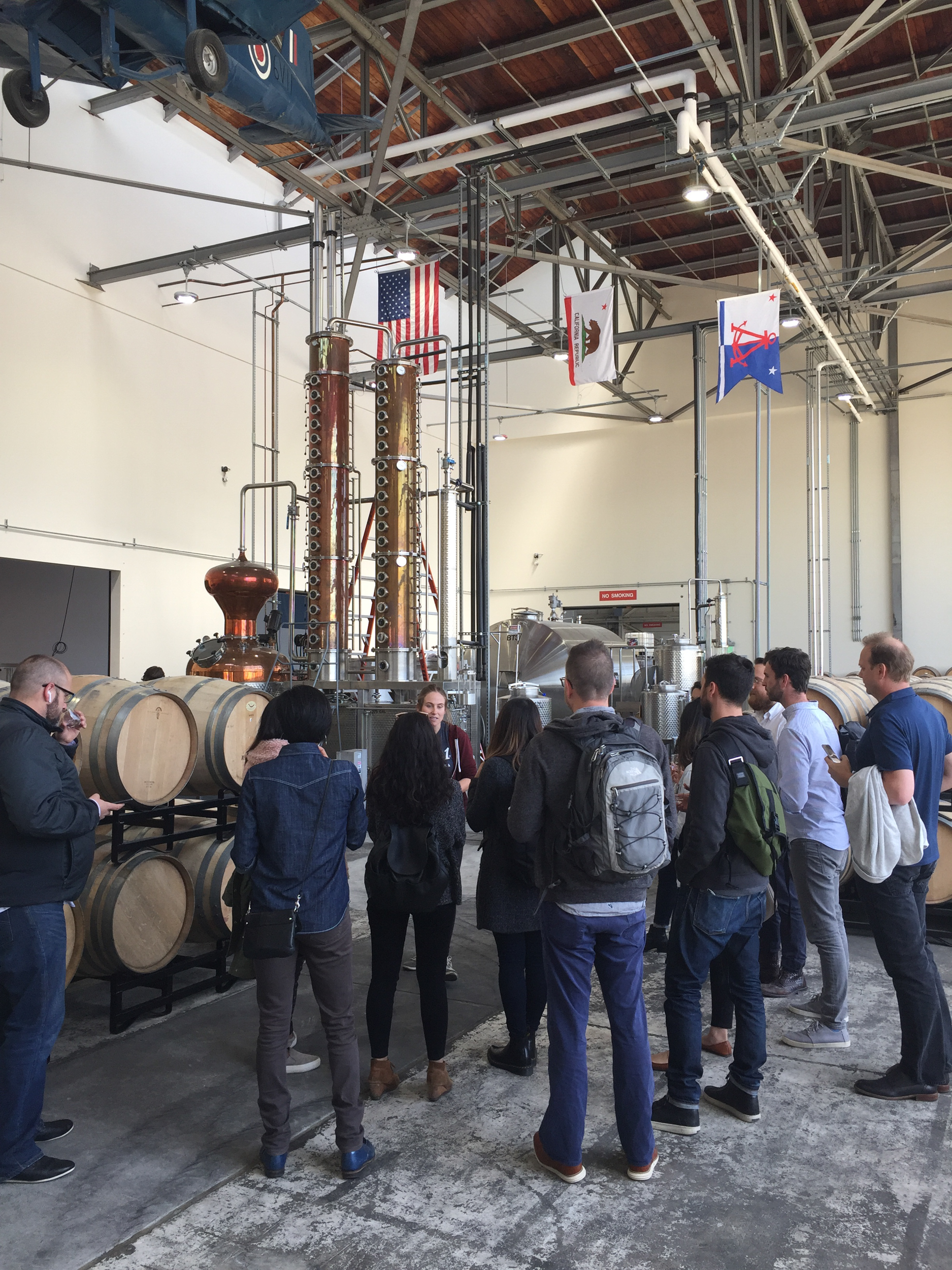 VDT Staff learn about the vodka distilling process at Hangar 1