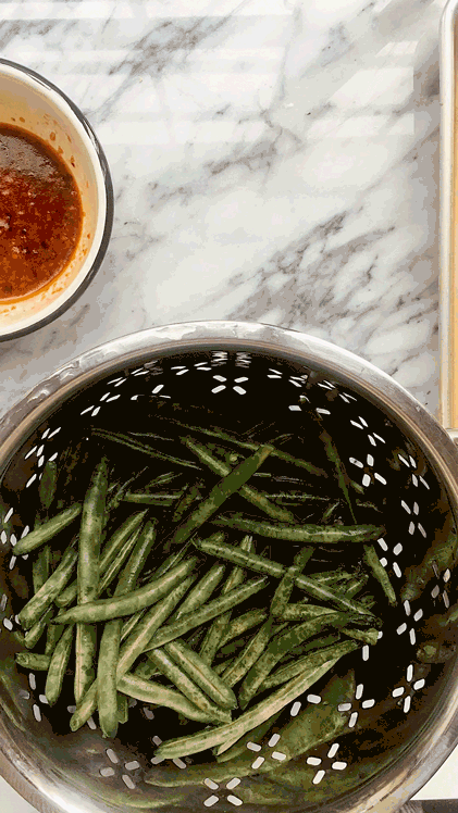 STEP 3: Coat the green beans and set aside until you’re ready to roast and serve.