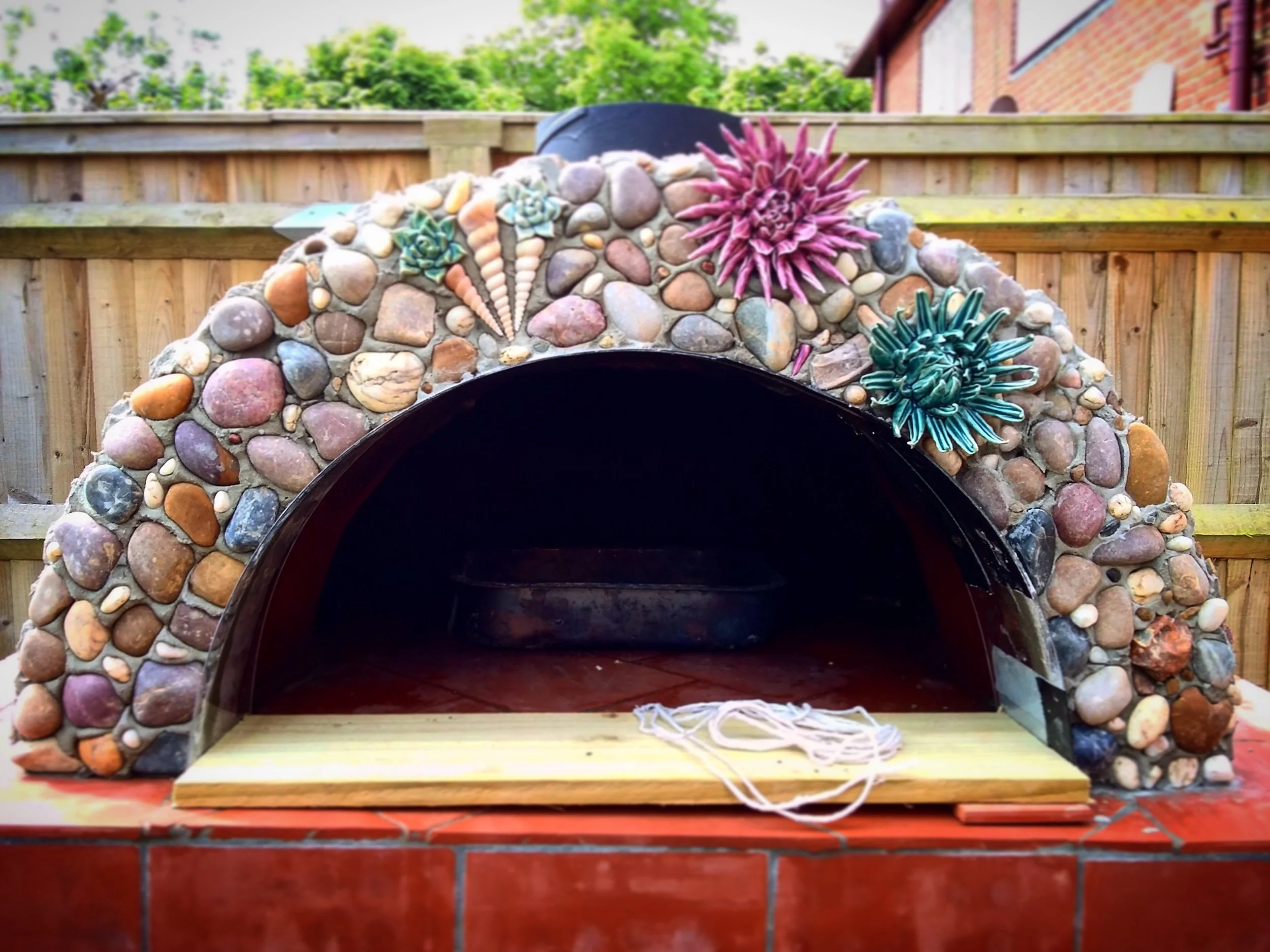 special sea shell finish to the pizza oven