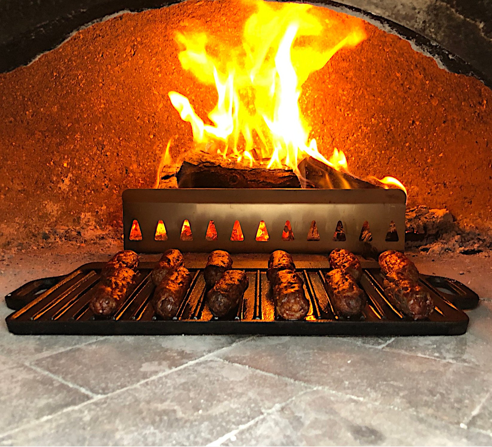 Pizza oven Christmas or Birthday Gift, Controlling the heat in a pizza oven, Browning Ovens Fire Shield, cooking in a Pizza oven Pizza Oven Fire Heat Shield with 2 way heat setting feature.