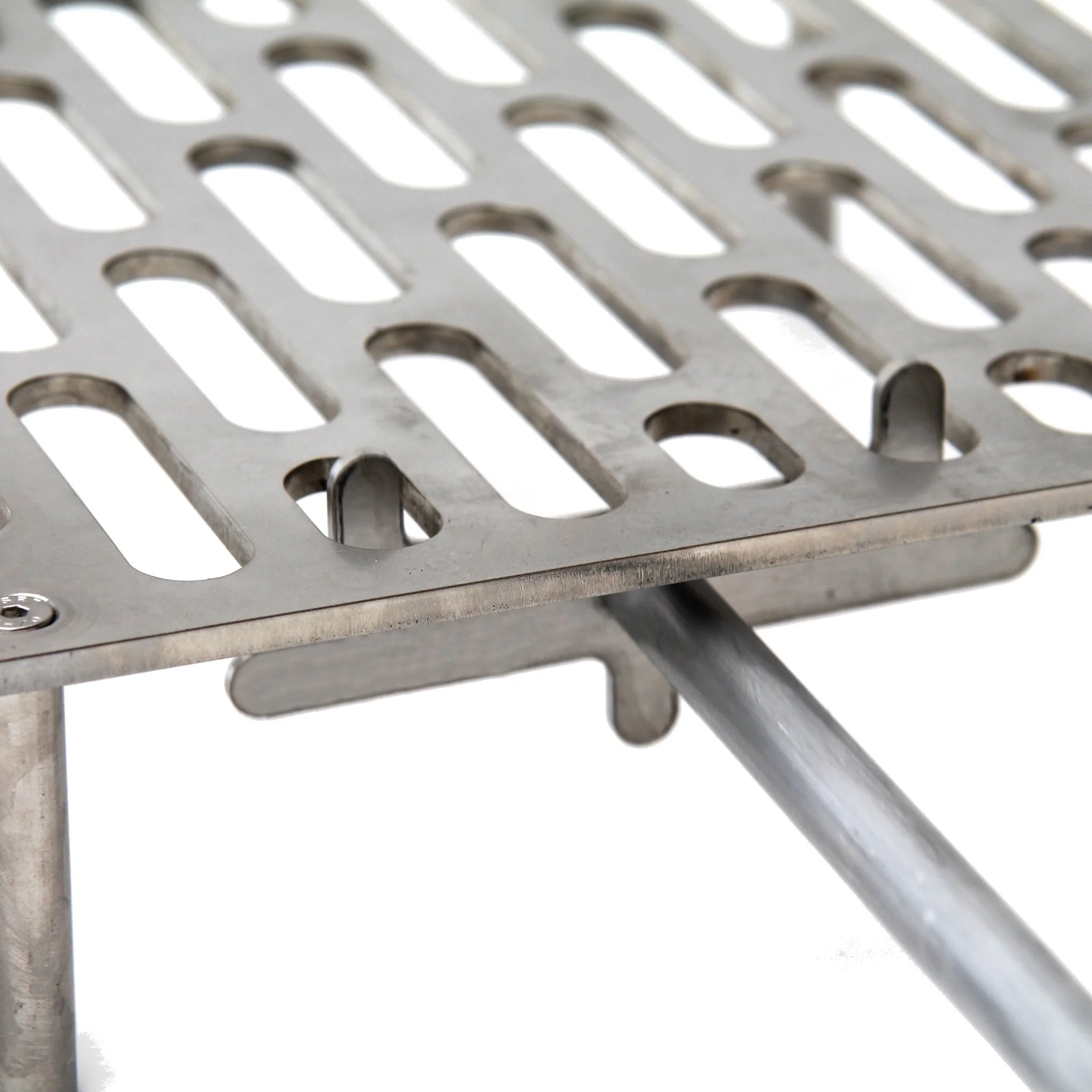 Hook n Push tool hooking a Tuscan grill, cooking in a pizza oven