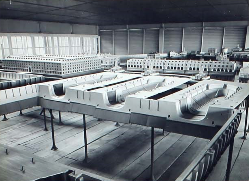 The Sheerness Dockyard model, viewed from the basin with the huge store house behind