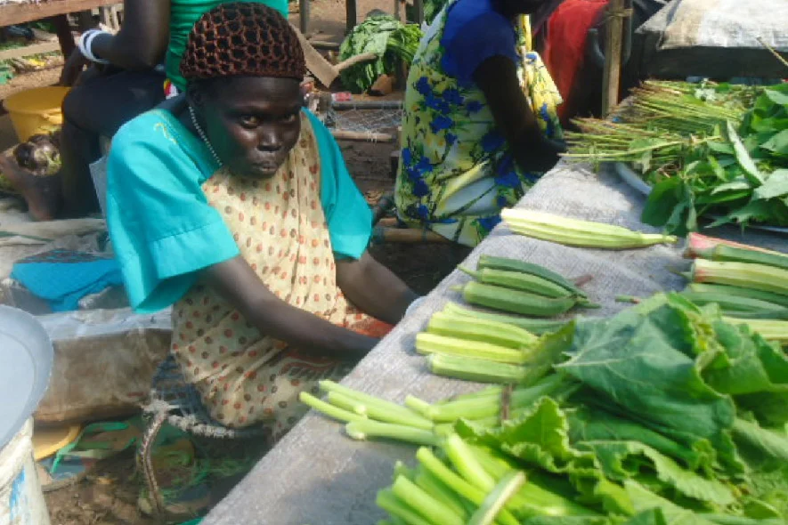 Kondok sells vegetables at a market stall in South Sudan as part of her new business.