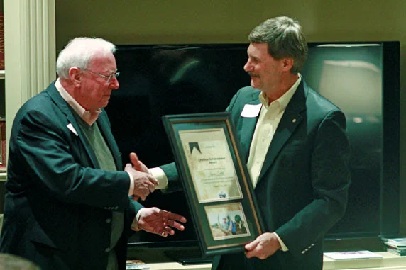 Jim Oakes receives a Lifetime Achievement Award from Dale Stanton-Hoyle