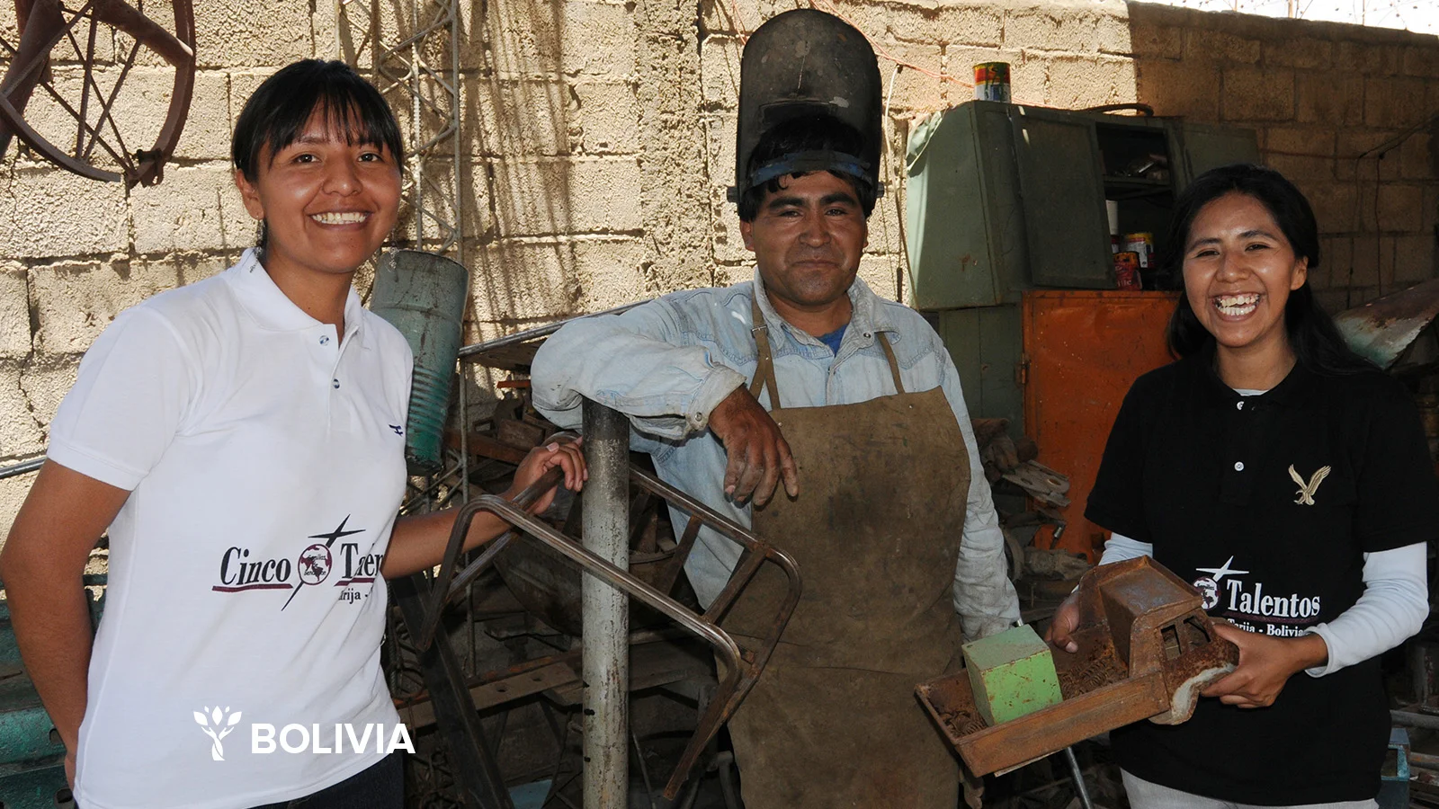 Alejandro is a metal worker in Bolivia. Pictured here with Five Talents leaders Sarah and Eva.