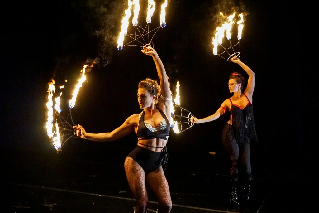 Shannon Corbeil and Anne-Marie Talmadge perform a fire fan duet. Image by Zach Davidson.