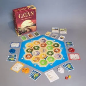 In Catan (formerly The Settlers of Catan ), players try to be the dominant force on the island of Catan by building settlements, cities, and roads. On each turn dice are rolled to determine what resources the island produces. Players collect these resources (cards)—wood, grain, brick, sheep, or stone—to build up their civilizations to get to 10 victory points and win the game. $49.99