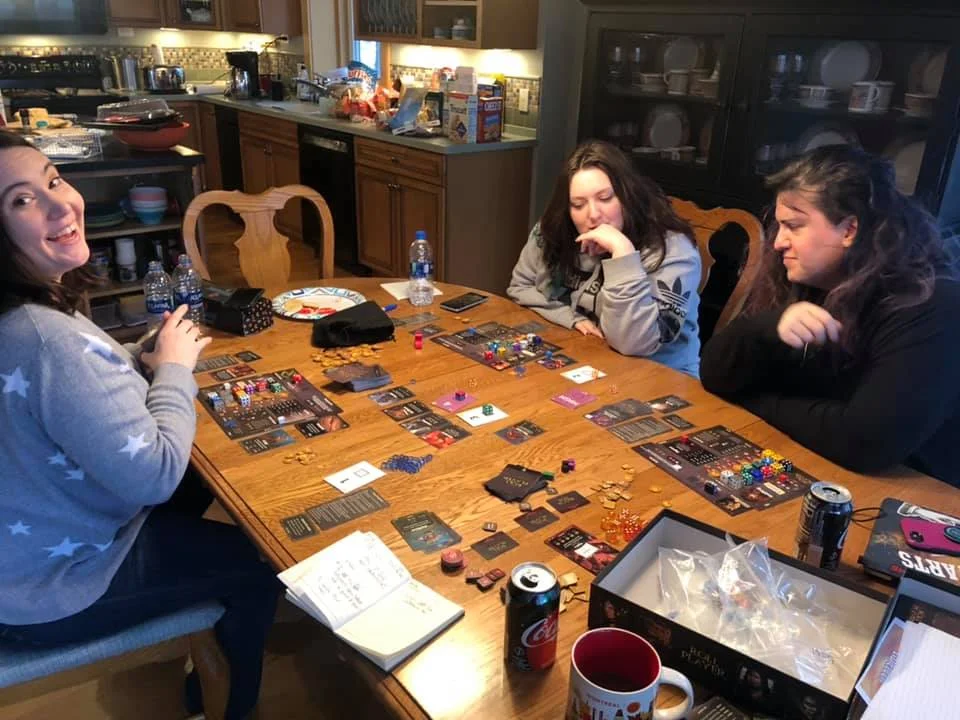 An artist, a marketing director, and a game design teacher sit down at a table…