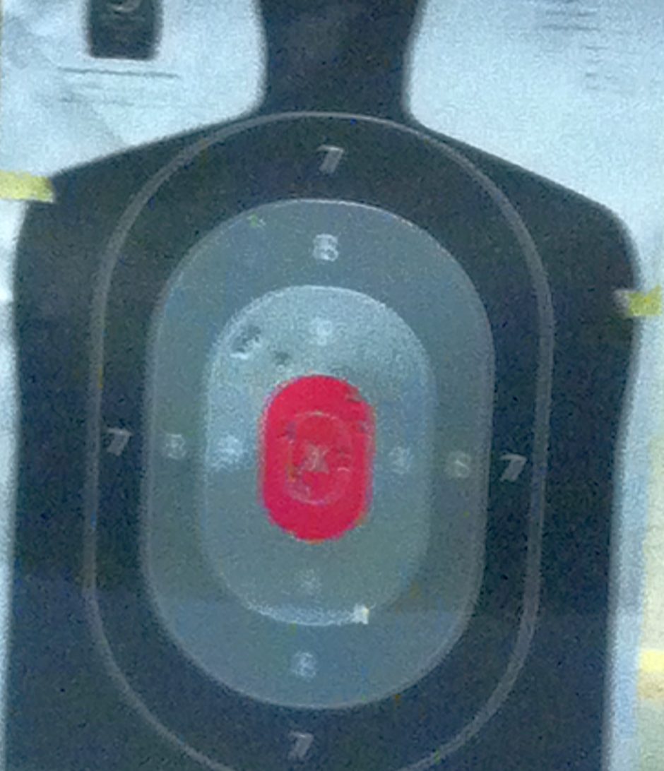 My new student’s first magazine at 10 feet. It’s a fuzzy cell phone pic under crappy indoor range lighting, but I think she did pretty well!