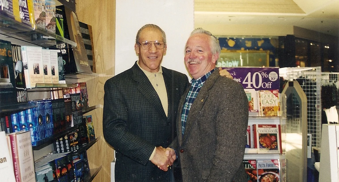 Bruno Sammartino with Jim O'Brien at a book signing at Century III Mall.