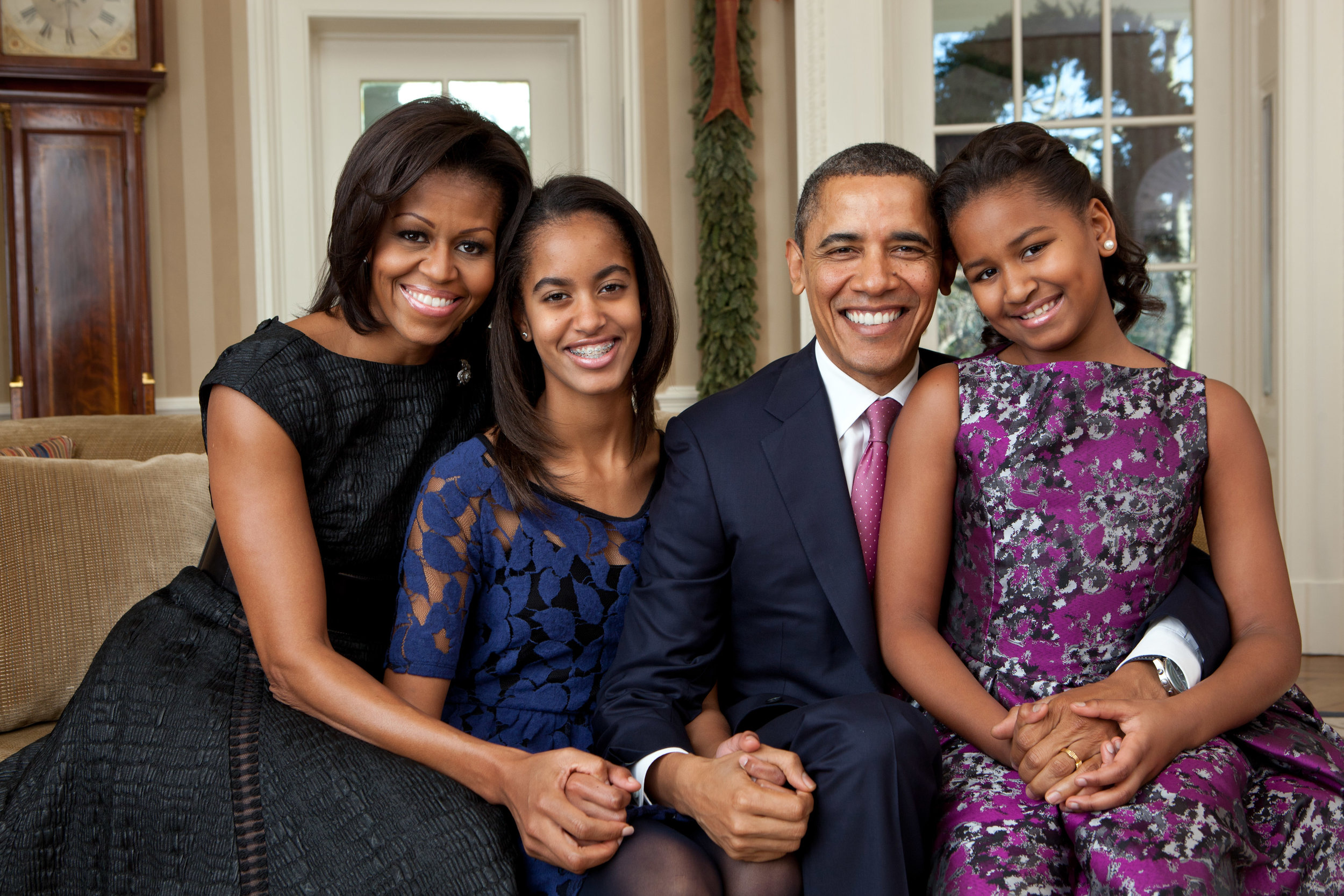  President Barack Obama, First Lady Michelle Obama, and their daughters, Sasha and Malia, sit for a family portrait in the Oval Office, Dec. 11, 2011. (Official White House Photo by Pete Souza)

This official White House photograph is being made avai