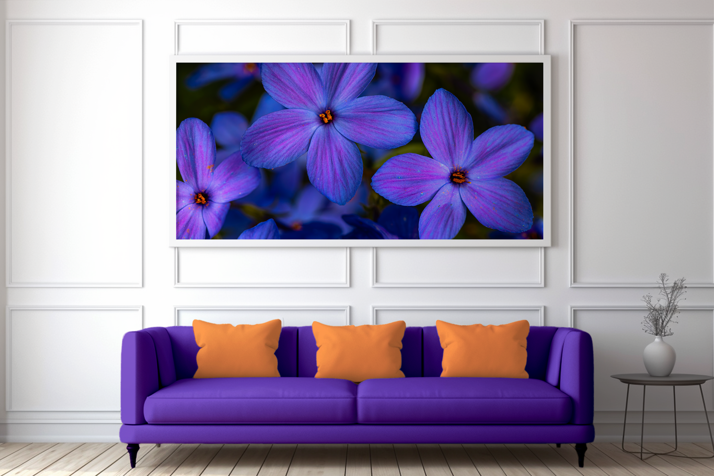 Purple and Blue Flowers over purple couch.png