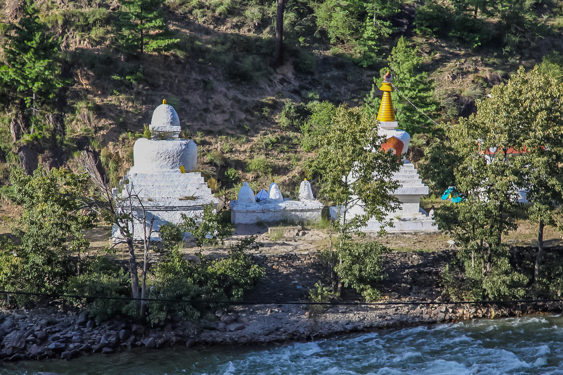  The meeting of two rivers, with stupas representing Hinduism, Thai Buddhism, Nepalese Buddhism and Bhutan Bhuddism. (Did I get that right, Chencho?)&nbsp; 