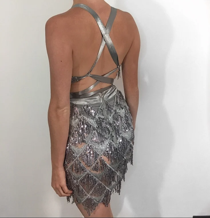 silver dress with tassels