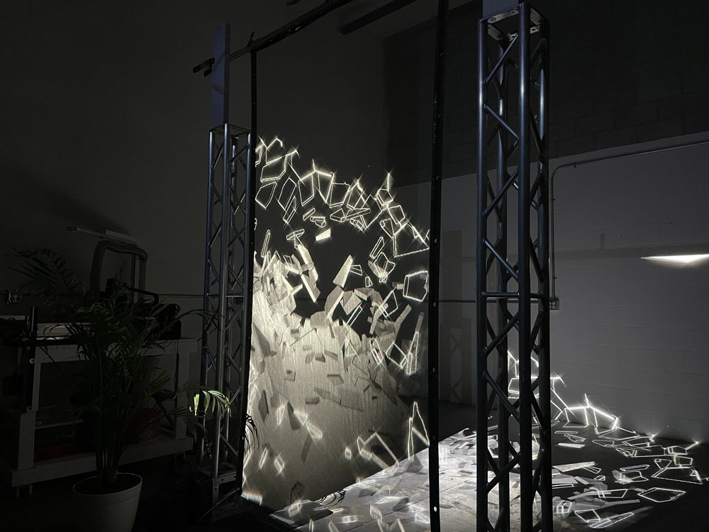 Casey Scalf WALKING AROUND A HOLOGRAPHIC PROJECTION MAPPING SCREEN 2.JPG
