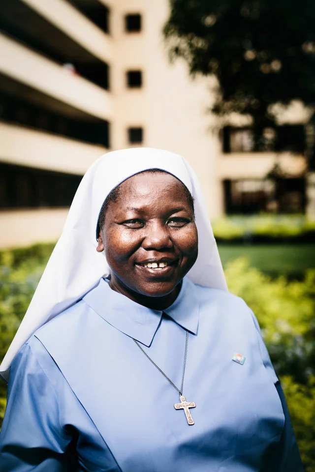nun-character-portrait-uganda-travel-photographers-from-canada-cooper-and-ohara.jpg