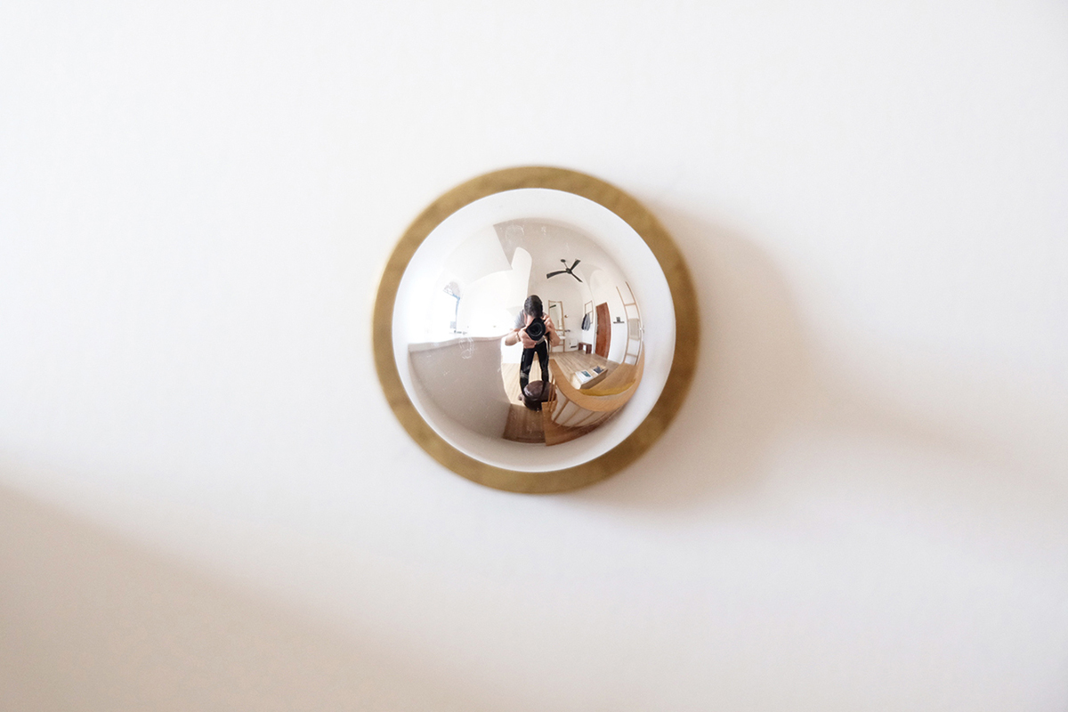 To compliment the furniture, a simple wall lamp was developed by combining off the shelf parts of cast and knurled brass. The lamp’s utilitarian design remains a quiet addition to this room’s experience.