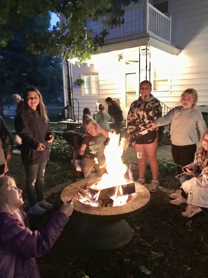 Girls around the firepit.jpg