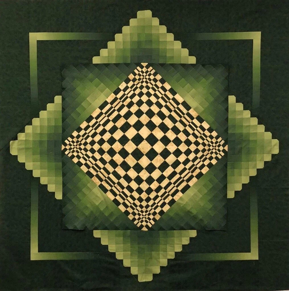 Pat Surra’s Convex Illusion bargello quilt seems three dimensional. Come see her quilts at WonderLab.