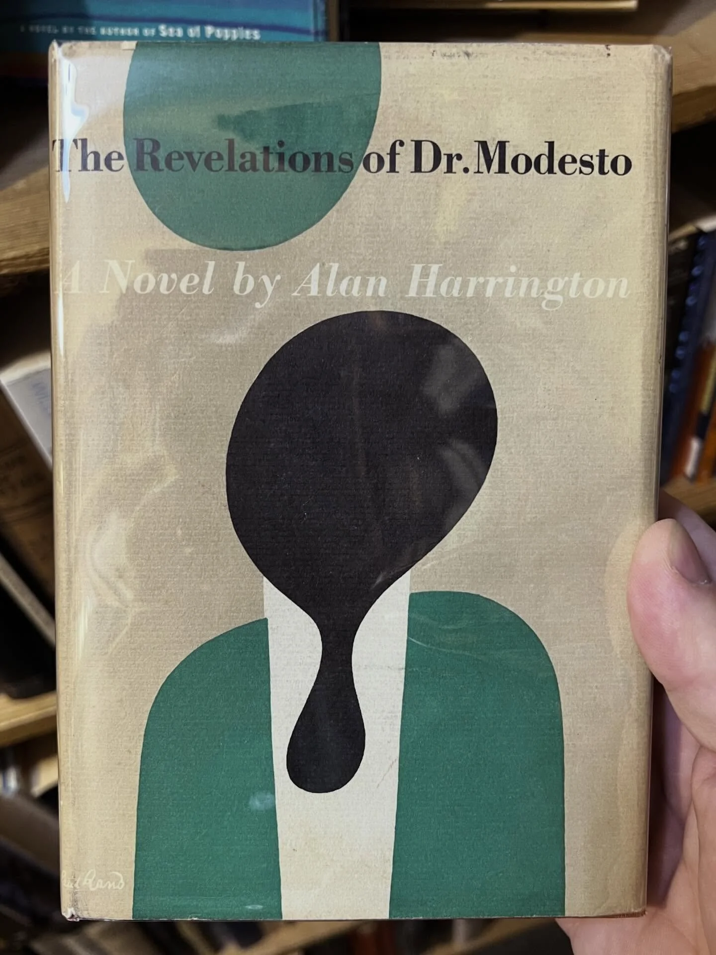 Classic Paul Rand 1955 book cover design for &ldquo;The Revelations of Dr. Modesto&rdquo; spotted in the wild at @bookhousedinkytown. (There&rsquo;s also some brand new copies of Cataract Quarterly now available there as well!) #vintagebookcover #pau