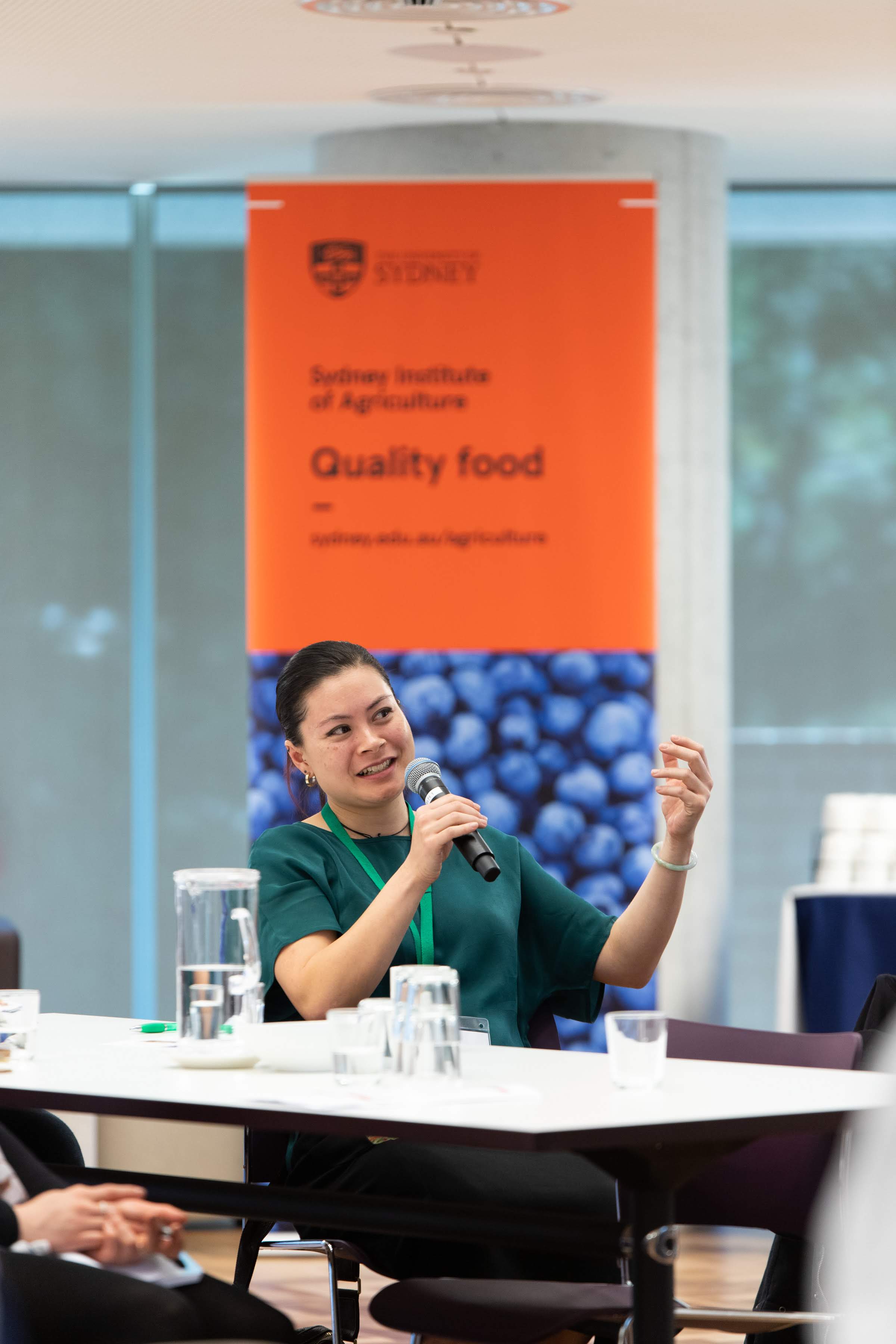 Dr Kim-Yen Phan-Thien asking a question at research symposium