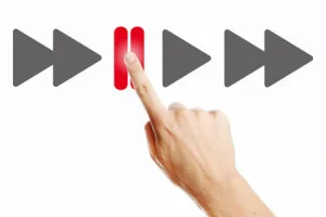 hand-on-pause-button-300x200.jpg