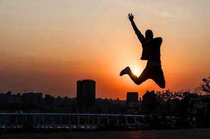 young man dancing during sunset.jpg