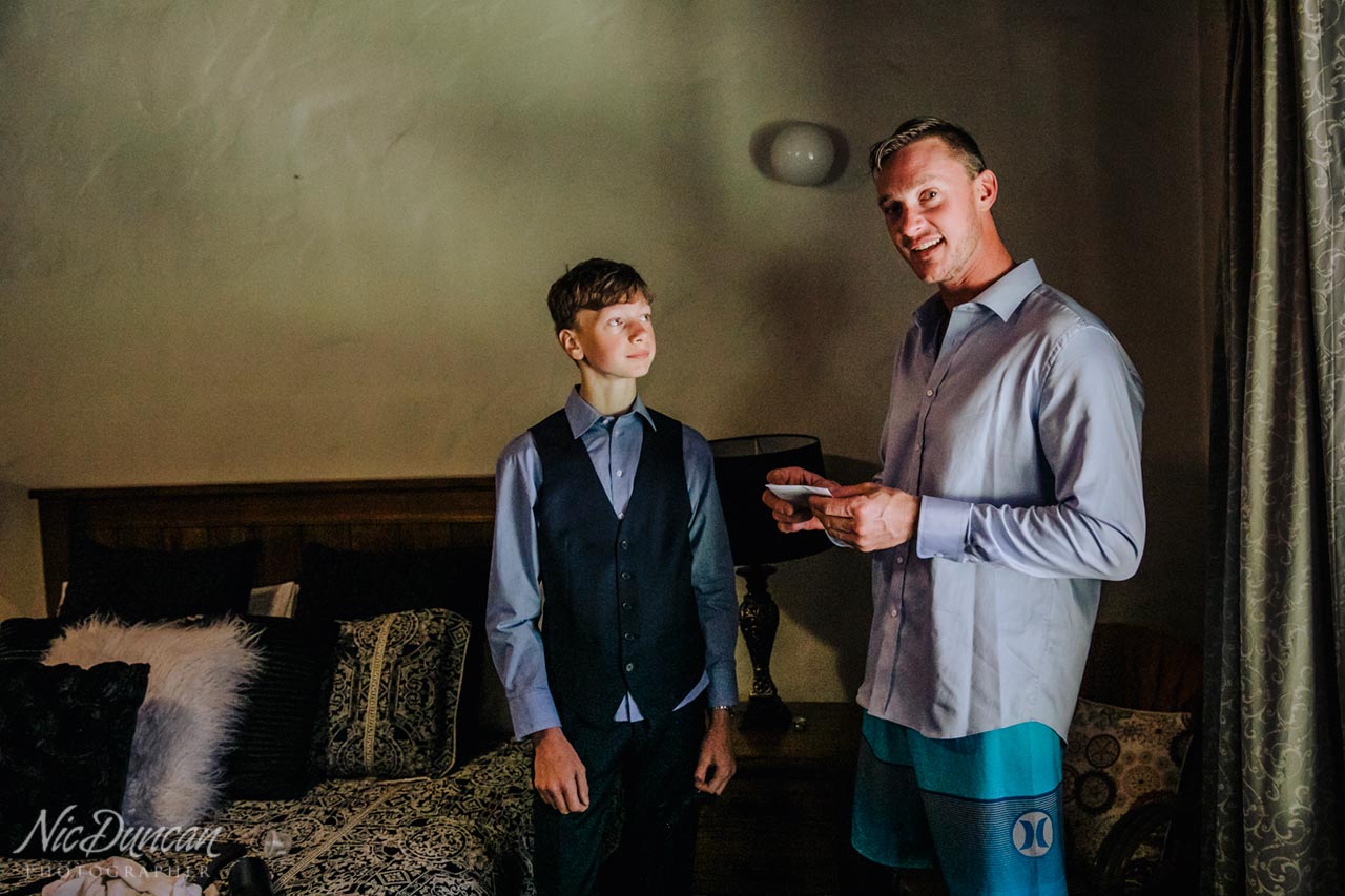 Groom and son getting ready together