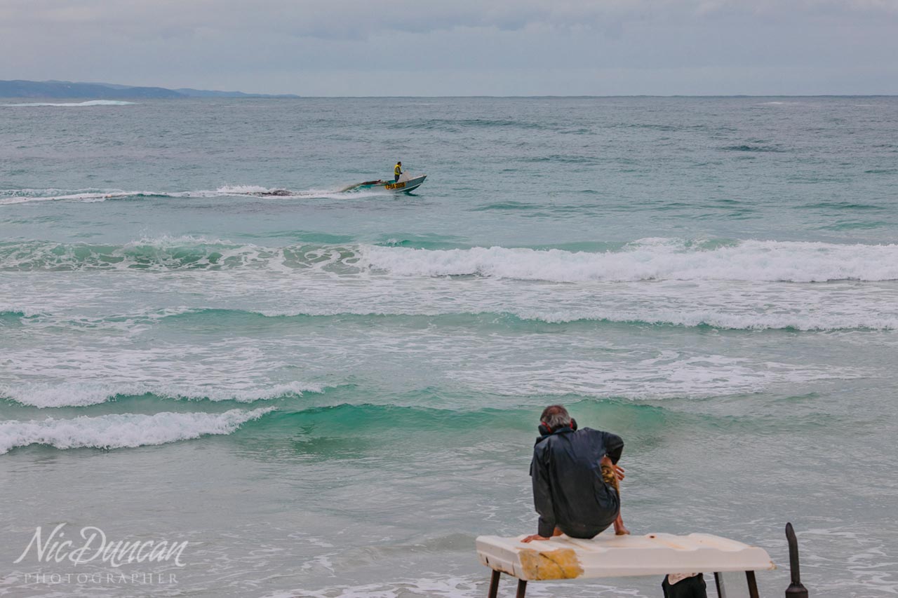 Keeping an eye on the approaching school of Australian Salmon from the roof of the old tractor