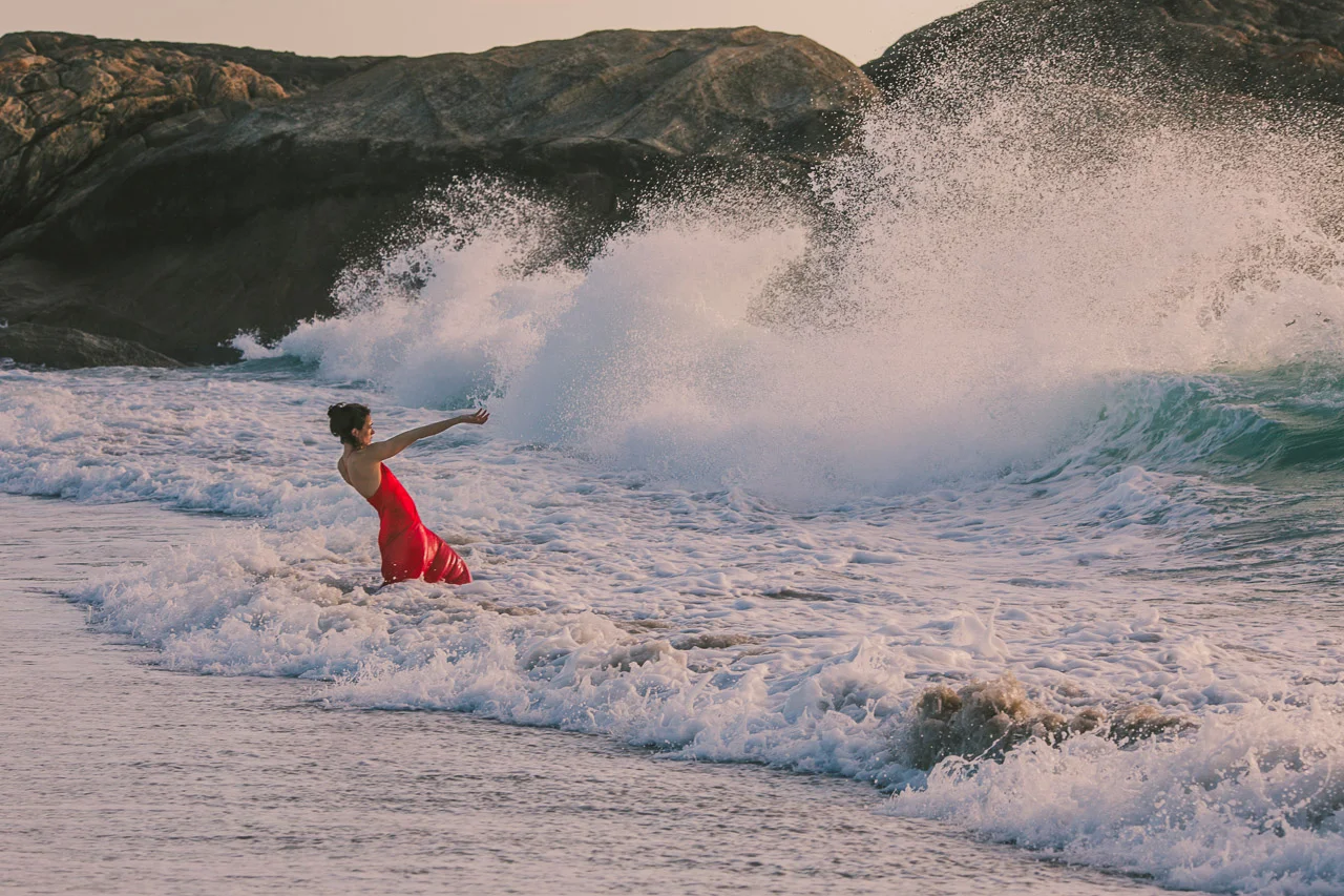 Forces of nature, artist Kate Gillett holding back the ocean.