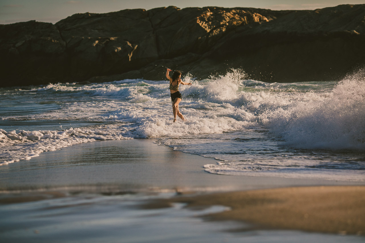 Woman dancing in the waves