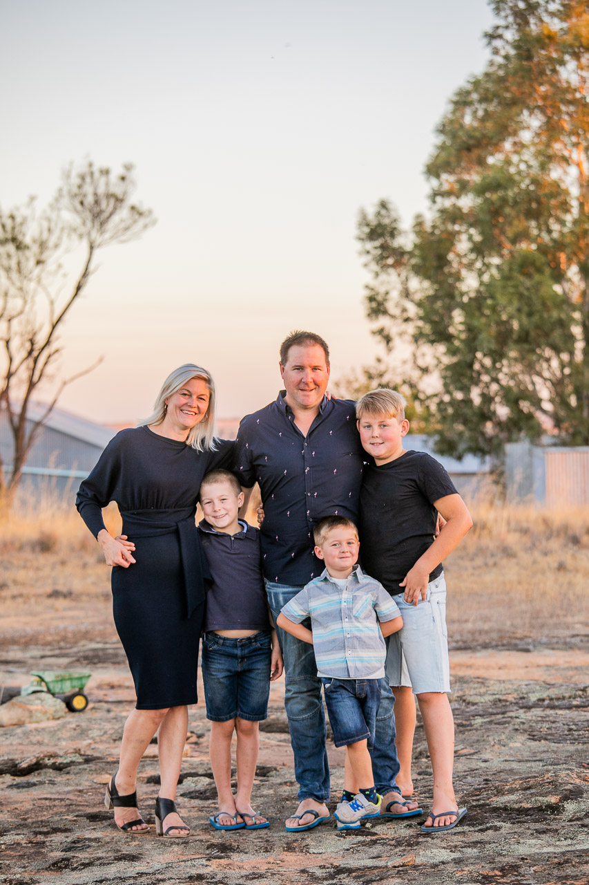 Family portraits by the farmhouse on a broad acre farm in the Wheatbelt of Western Australia