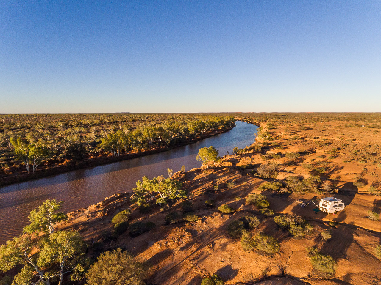 The Murchison River flowing and brown after the recent rains and the run-off