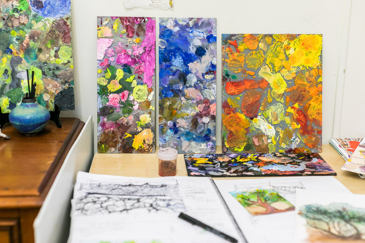 Palettes of colour in Sue Helmot's art studio