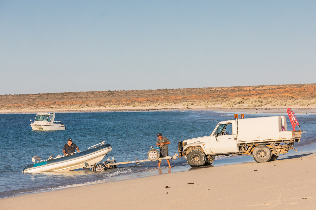 Towing a boat out of the water at Gnaraloo Bay
