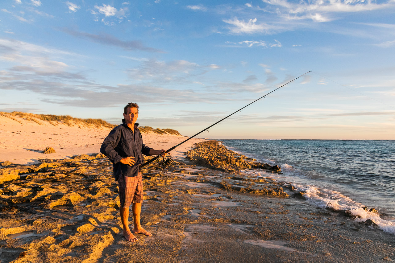 Beach fishing in Western Australia at sunset