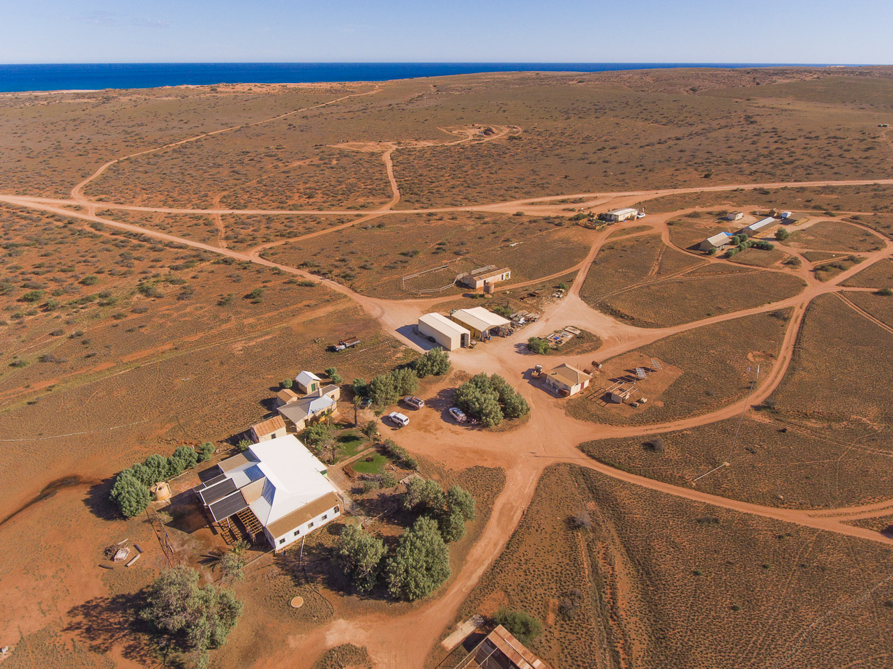Aerial photo of the homestead and station buildings, looking towards the west coast at Warroora Station in Western Australia