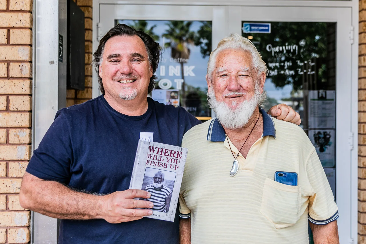 Alex Kailis with Pancho Ridley, and his freshly signed copy of Pancho’s book