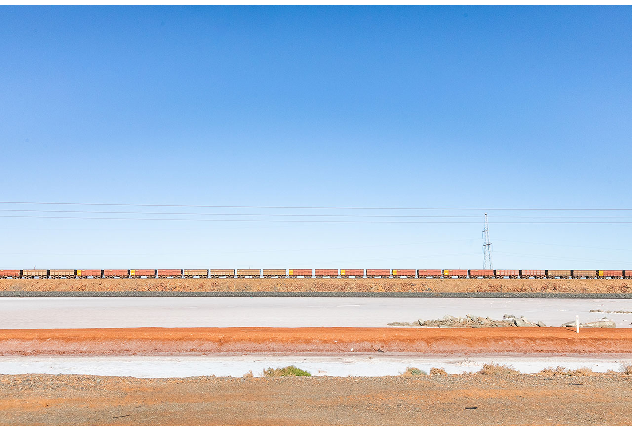 Empty wagons of a Rio Tinto train on the causeway near Karratha, Western Australia