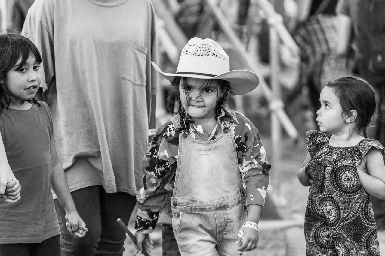 Young girl with a big cowboy hat and an even bigger attitude