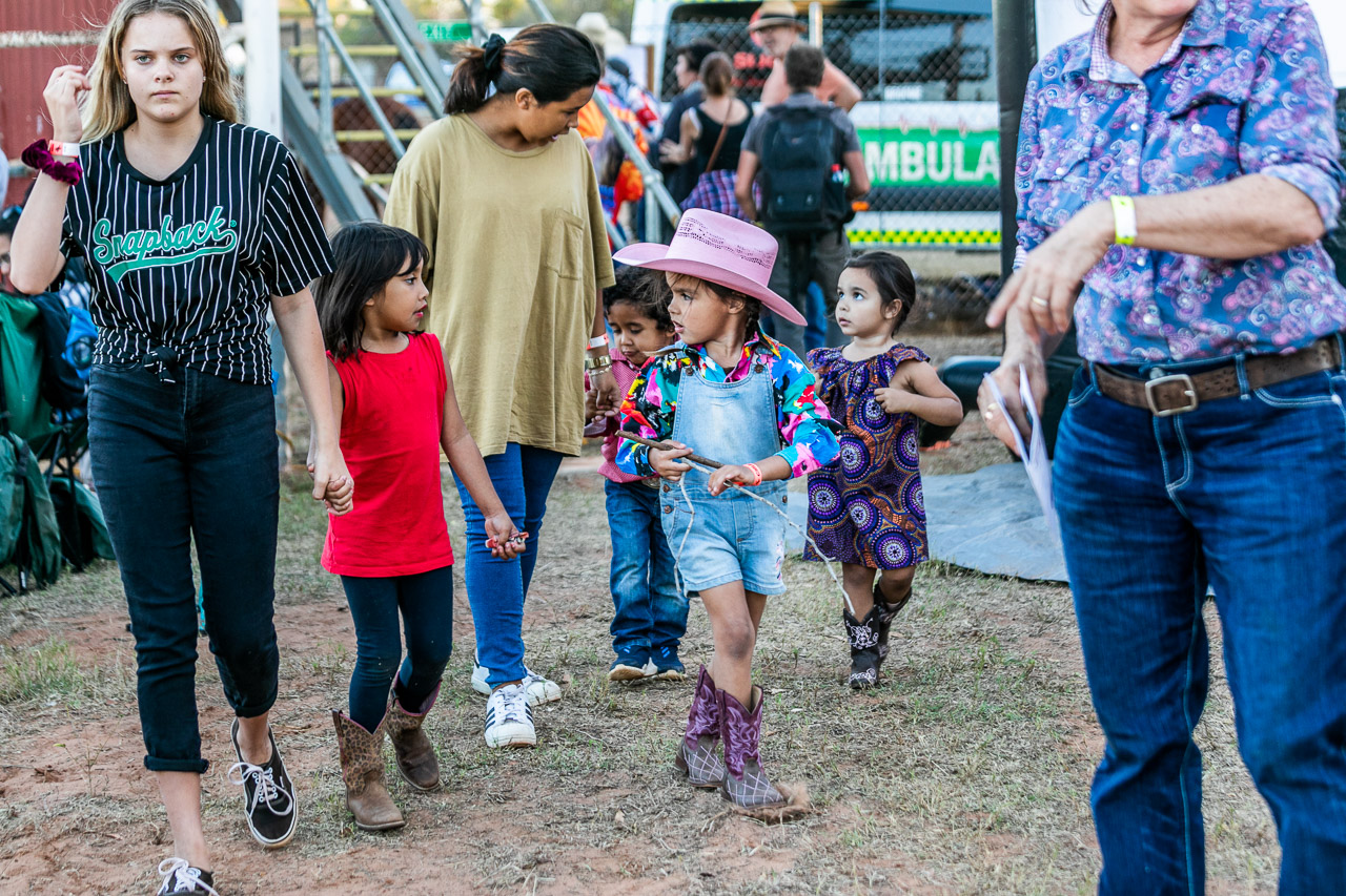 Young girls with adults at the Broome Rodeo
