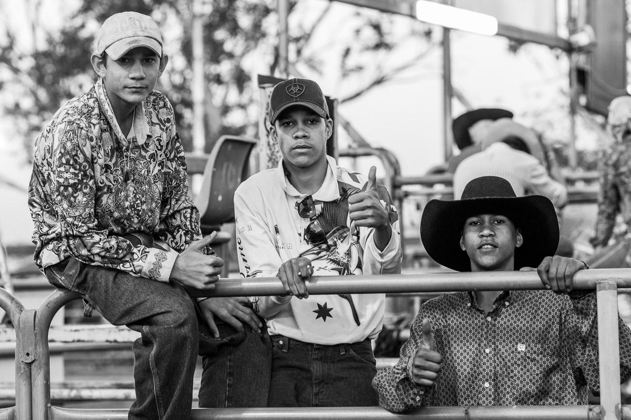 Three teenage boys at the rodeo